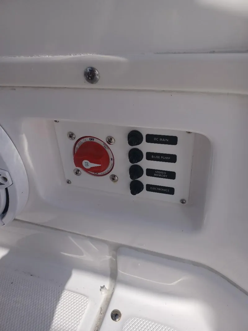Slide: The Image of Control panel on 2022 Everglades 243 Center Console boat. - 25