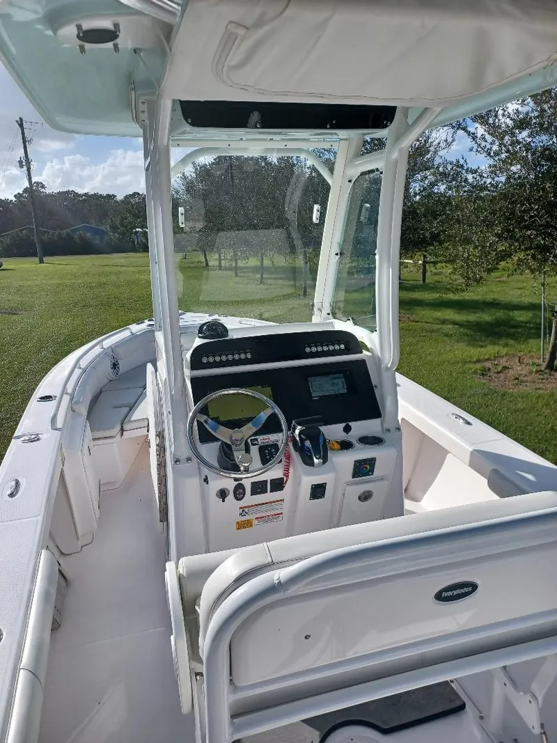 Slide: The Image of 2022 Everglades 243 Center Console boat with modern helm and spacious seating. - 6