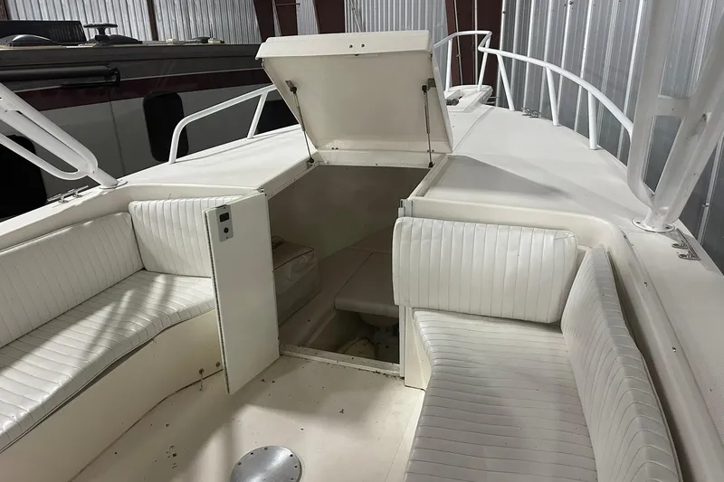 Slide: The Image of 2004 Salt Shaker 30 boat in a warehouse, viewed from the bow. - 10