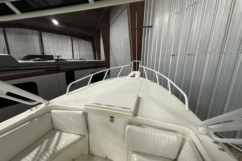 Slide: The Image of Interior view of a 2004 Salt Shaker 30 boat in storage. - 12