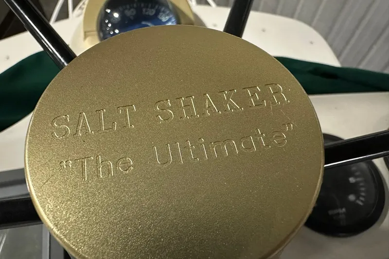 Slide: The Image of Gold-colored Salt Shaker 30 helm with "The Ultimate" engraving, 2004 model. - 20
