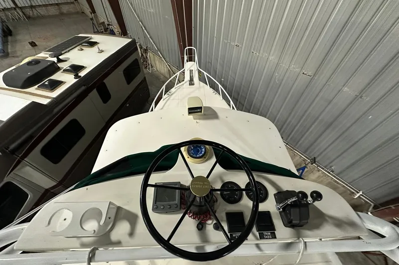 Slide: The Image of 2004 Salt Shaker 30 boat in indoor storage, elevated on stands. - 6