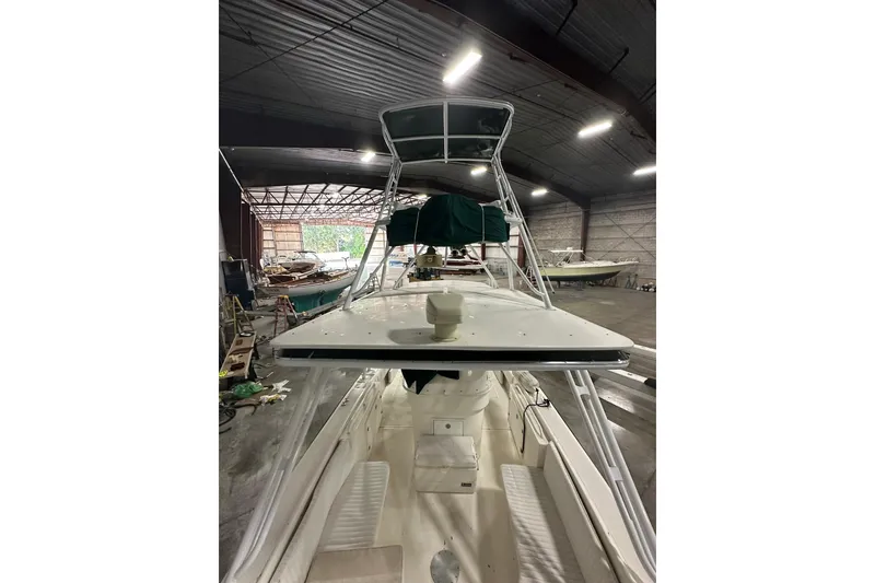 Slide: The Image of Salt Shaker 30 boat named "Marie" in a warehouse, South Bass Island. - 7