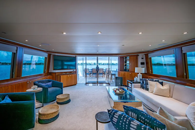 Slide: The Image of Luxurious interior of 2006 Westport 112 yacht with elegant seating and panoramic windows. - 7