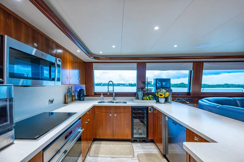 Slide: The Image of Luxurious kitchen interior on 2006 Westport 112 yacht with modern appliances and ocean view. - 24