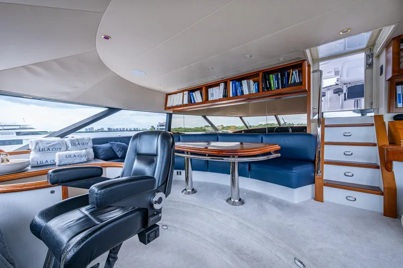 Slide: The Image of Luxurious interior of 2006 Westport 112 yacht with leather seating and wooden accents. - 70
