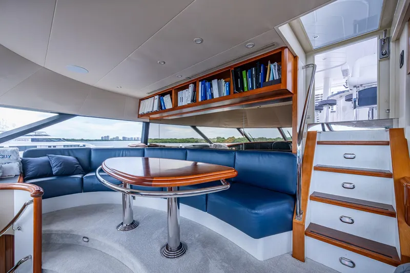 Slide: The Image of Luxurious interior of 2006 Westport 112 yacht with elegant seating and wooden accents. - 73