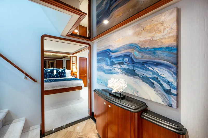 Slide: The Image of Luxurious interior of 2006 Westport 112 yacht with modern art and elegant bedroom. - 27