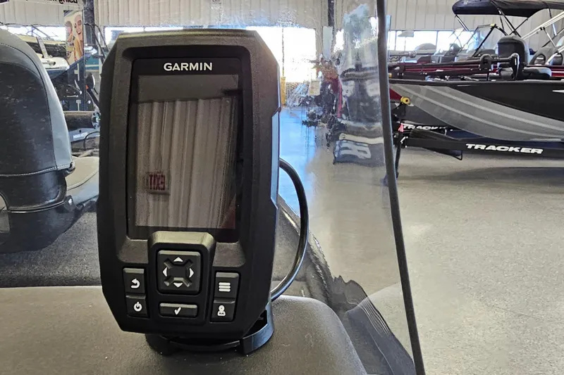 Slide: The Image of Garmin device on 2026 Tracker Bass Tracker Classic XL boat in showroom. - 11