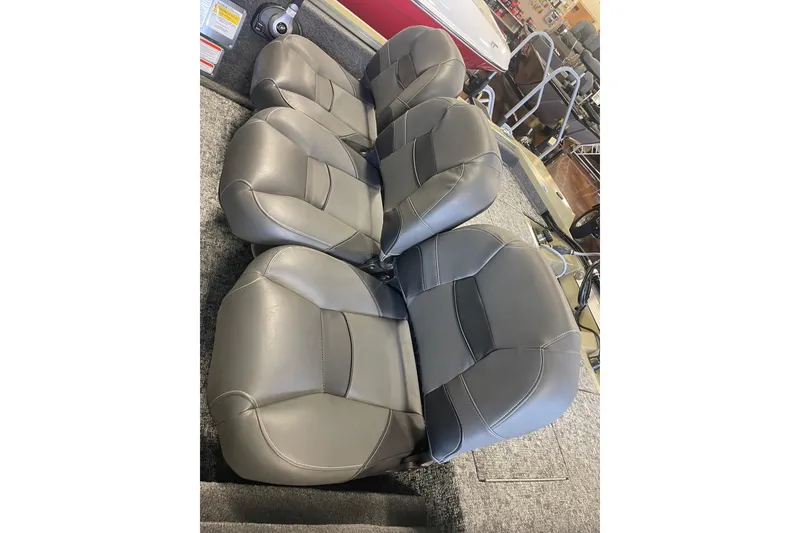 Slide: The Image of 2026 Tracker Pro Team 175 Crappie Edition boat seats, gray leather, showroom display. - 5