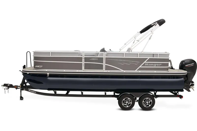 Slide: The Image of 2025 Ranger Reata 223C boat interior with beige seating and wood-style flooring. - 4