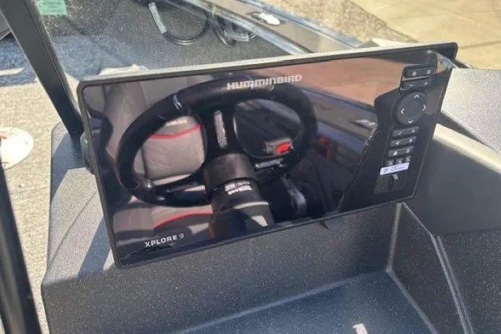 Slide: The Image of 2026 Tracker Targa V-19 Combo boat dashboard with Humminbird Xplore 9 display. - 17