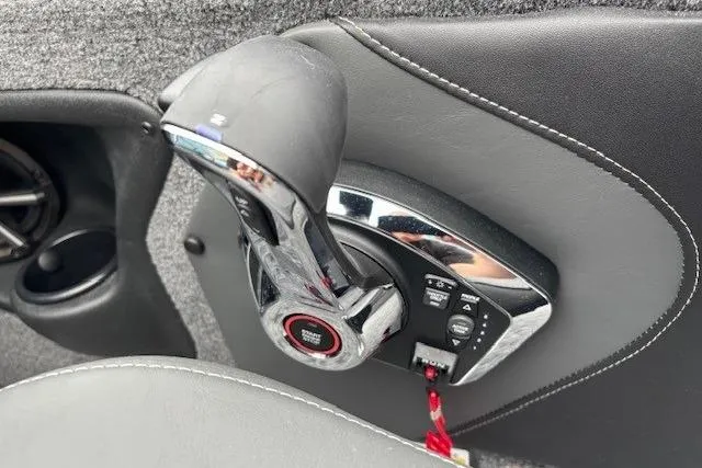 Slide: The Image of Throttle control of 2026 Tracker Targa V-19 Combo boat, featuring sleek design and chrome accents. - 18