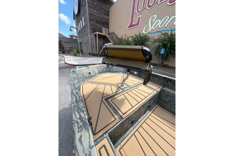 Slide: The Image of 2026 Tracker Grizzly 1650 T Prairie Wings Edition boat with camouflage design and seating. - 4