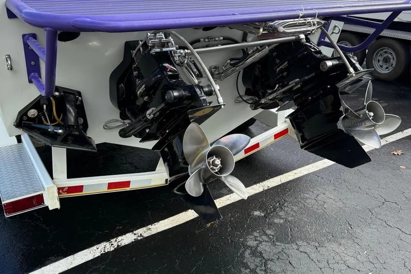 Slide: The Image of Rear view of a 2005 Baja 30 Outlaw boat with dual propellers. - 10