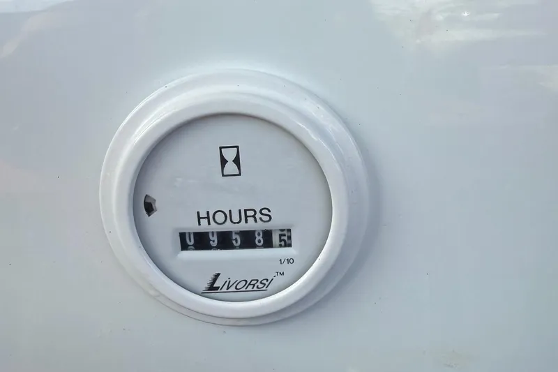 Slide: The Image of Hour meter on 2005 Baja 30 Outlaw boat, displaying 958.5 hours. - 16