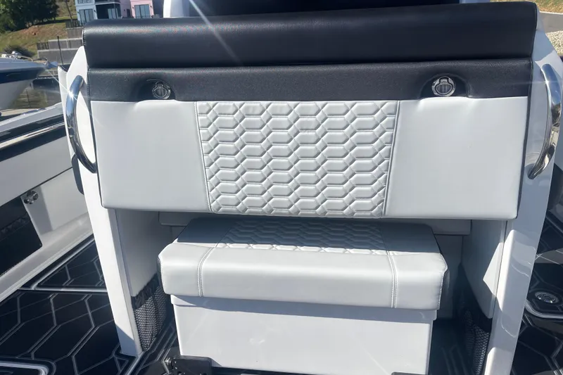 Slide: The Image of 2025 Nor-Tech 450 Sport Center Console boat seat with hexagonal pattern upholstery. - 25