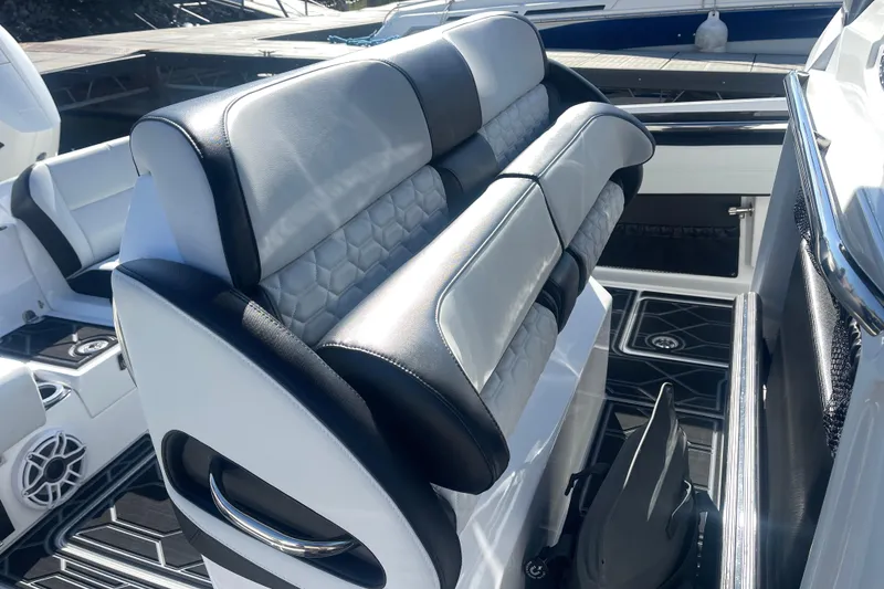 Slide: The Image of 2025 Nor-Tech 450 Sport Center Console with luxurious seating and modern design. - 26
