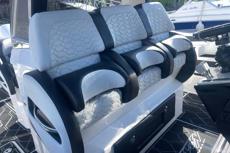 Slide: The Image of 2025 Nor-Tech 450 Sport Center Console luxury seating with modern design and premium materials. - 27