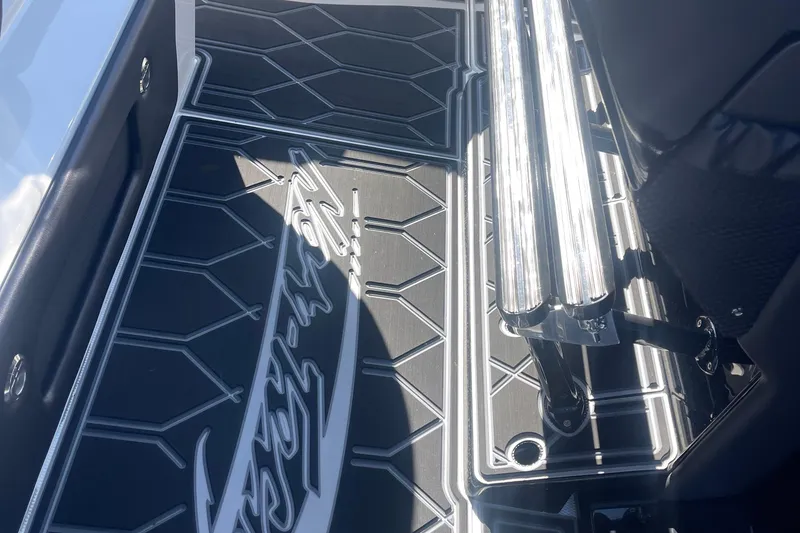 Slide: The Image of 2025 Nor-Tech 450 Sport Center Console interior with sleek, modern flooring design. - 32