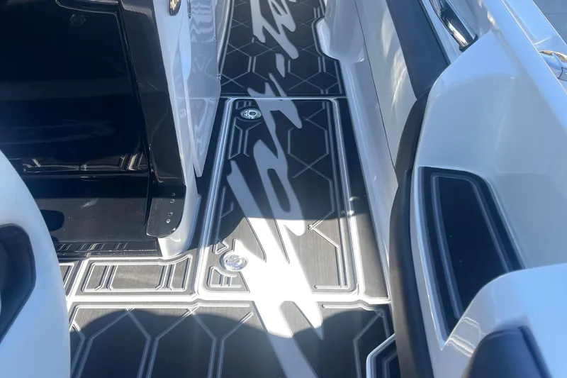 Slide: The Image of 2025 Nor-Tech 450 Sport Center Console with sleek deck design and modern detailing. - 34