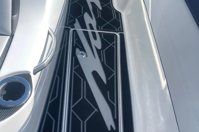 Slide: The Image of 2025 Nor-Tech 450 Sport Center Console deck with sleek design and modern detailing. - 36