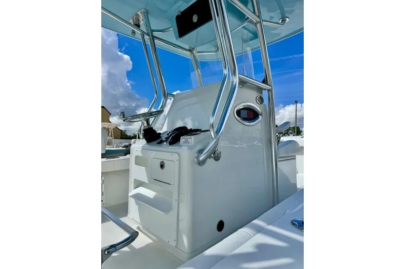 Slide: The Image of 2026 Pair Customs 24 Center Console DV boat with sleek design and modern controls. - 10
