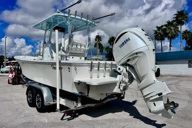 Slide: The Image of 2026 Pair Customs 24 Center Console DV boat with Yamaha engine on trailer. - 3