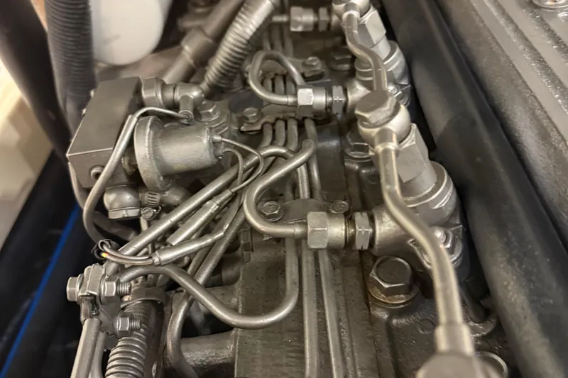 Slide: The Image of Engine compartment of a 2002 Hinckley Talaria 29C, featuring a Yanmar diesel engine. - 30