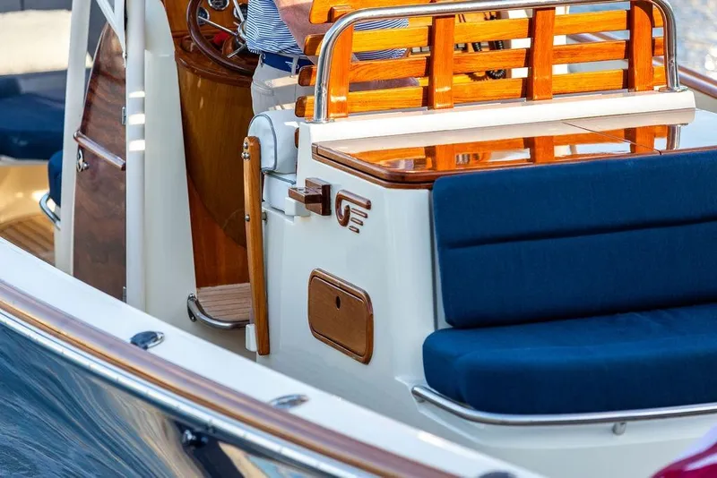 Slide: The Image of Lifebuoy on 2002 Hinckley Talaria 29C yacht deck, ocean in background. - 27