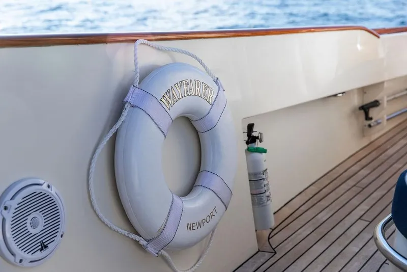 Slide: The Image of Hinckley Talaria 29C 2002 boat bathroom with wooden flooring and modern amenities. - 34