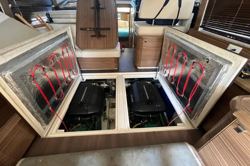 Slide: The Image of Engine compartment of a 2019 Greenline 40 yacht, showcasing dual Volvo Penta engines. - 24