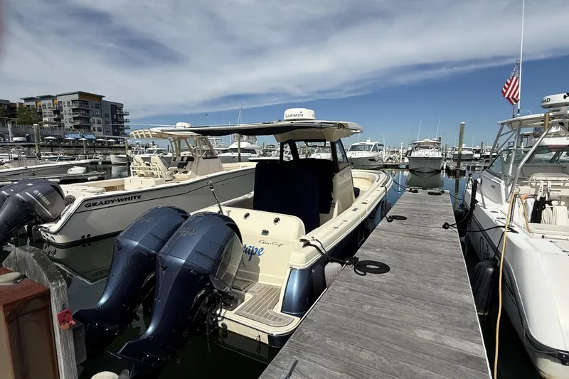 Slide: The Image of 2019 Chris-Craft Catalina 30 docked at marina with twin Yamaha outboard engines. - 4
