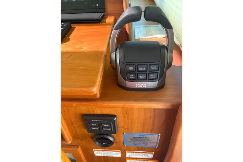 Slide: The Image of Dashboard of 2023 Sabre 45 Salon Express with Garmin navigation displays and controls. - 21