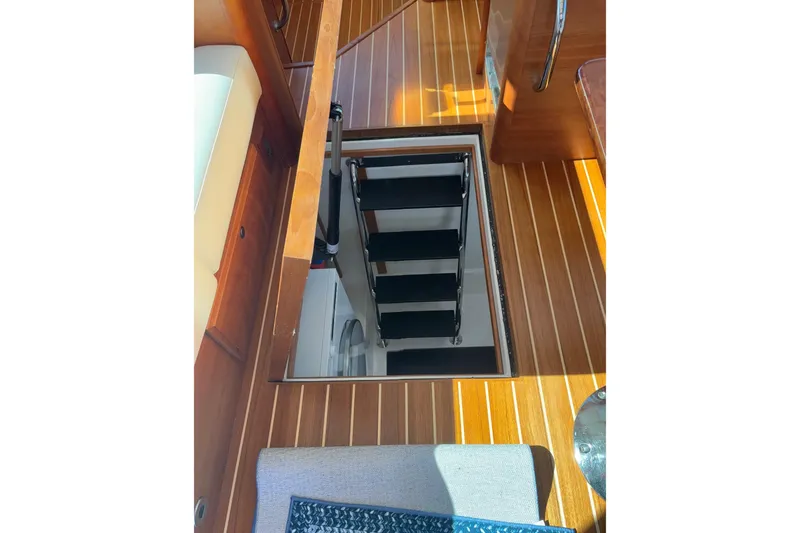 Slide: The Image of Stainless steel fridge on 2023 Sabre 45 Salon Express yacht, wooden interior. - 25