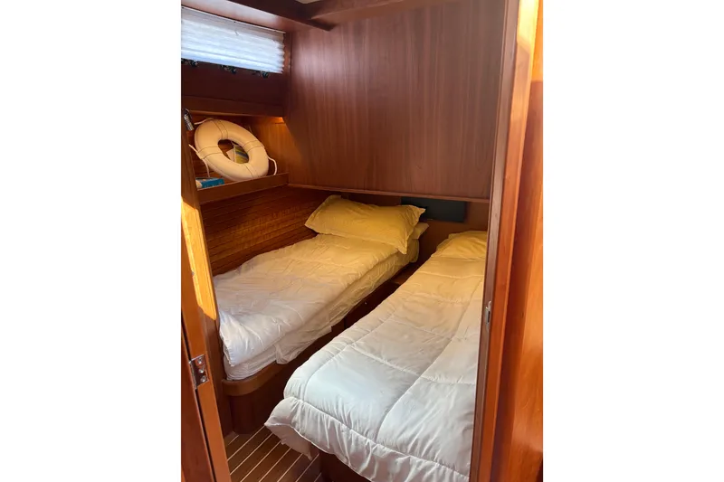 Slide: The Image of Luxurious interior of 2023 Sabre 45 Salon Express yacht, featuring elegant wood finishes and modern amenities. - 38