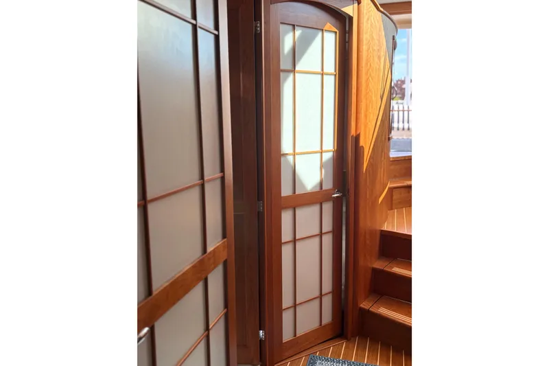 Slide: The Image of Bathroom interior of 2023 Sabre 45 Salon Express yacht, featuring modern shower and fixtures. - 42