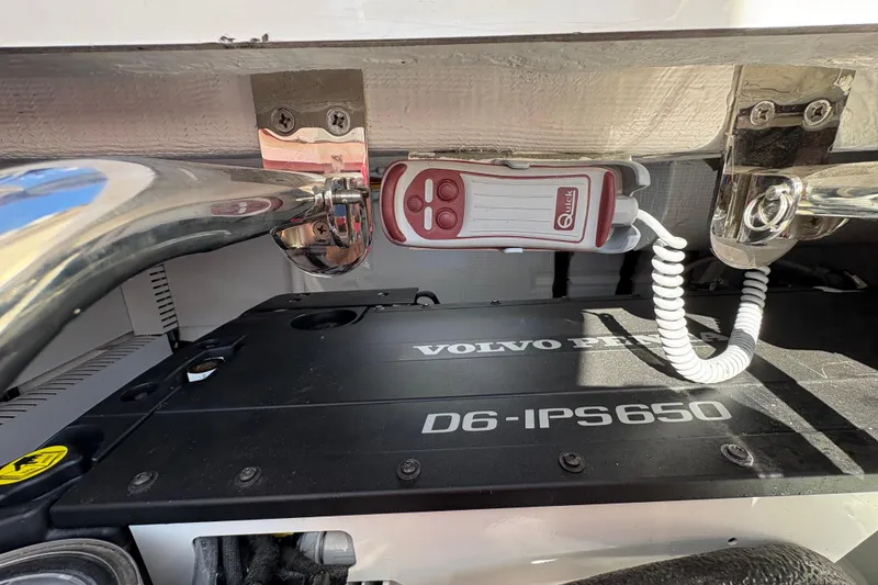 Slide: The Image of Interior of 2023 Sabre 45 Salon Express yacht, featuring wooden finishes and cozy cabin. - 45