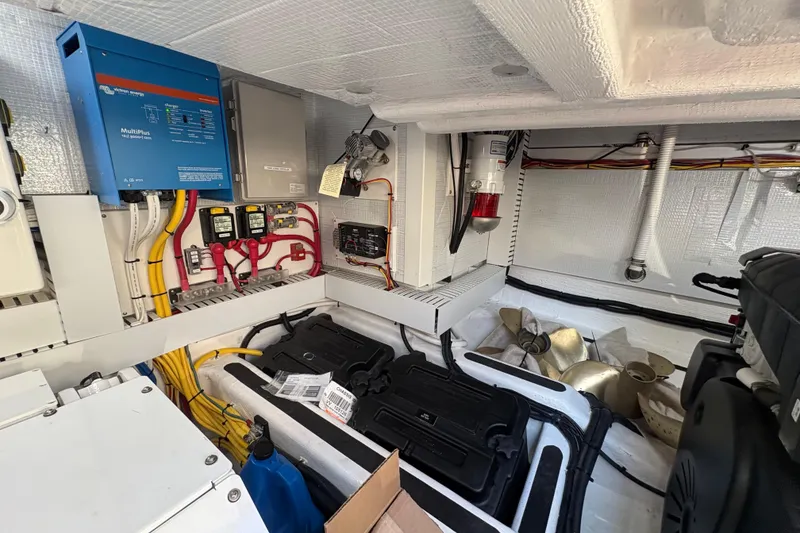 Slide: The Image of Engine room of 2023 Sabre 45 Salon Express with propeller and mechanical components. - 52