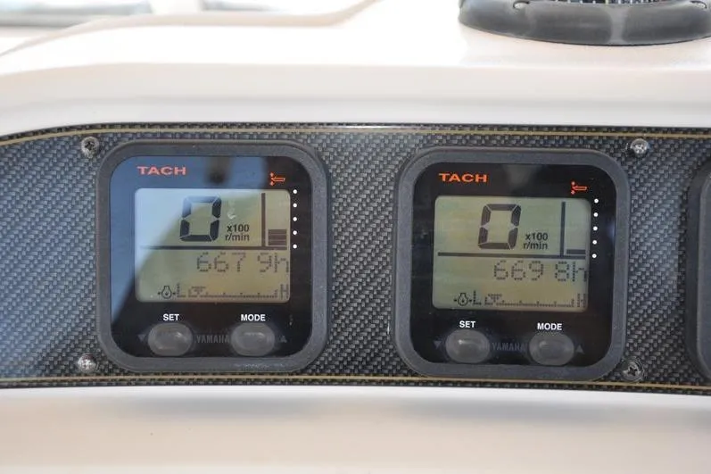 Slide: The Image of Tachometer display on 2010 Grady-White Chesapeake 290 boat dashboard, showing engine RPM. - 25