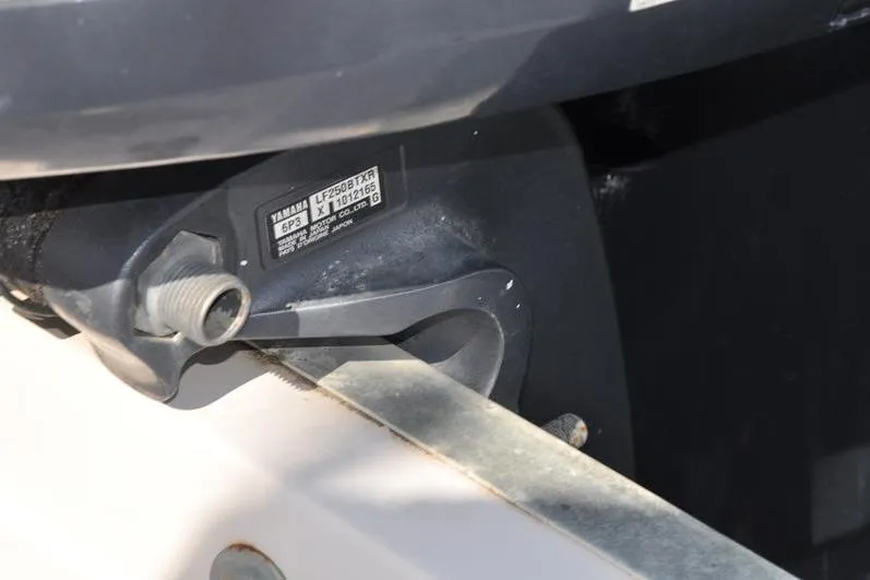 Slide: The Image of Close-up of a 2010 Grady-White Chesapeake 290 boat engine component. - 38