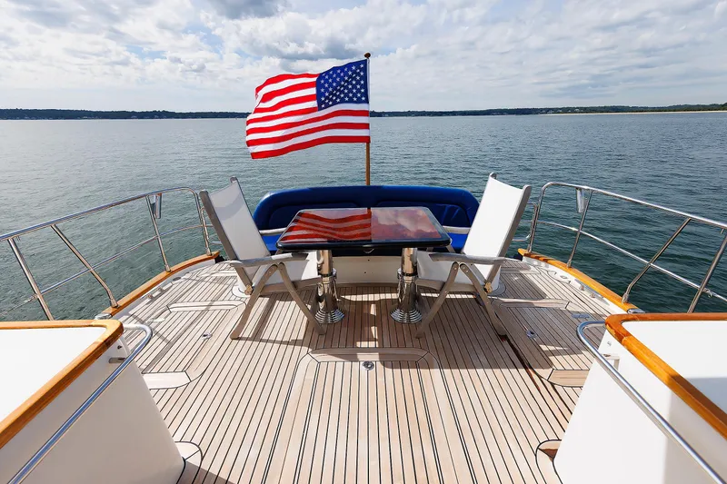 Slide: The Image of Luxurious cabin interior of 2009 Hunt Yachts 52 Express with elegant wood finish. - 3