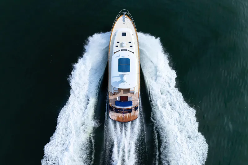 Slide: The Image of Engine room of 2009 Hunt Yachts 52 Express, showcasing mechanical components and systems. - 56