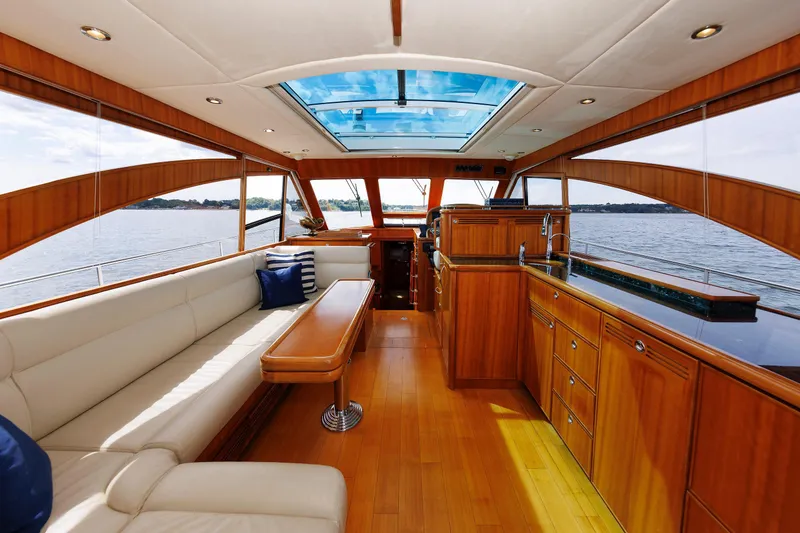 Slide: The Image of Luxurious interior of 2009 Hunt Yachts 52 Express with wood finish and ocean view. - 27