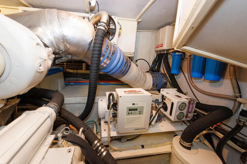 Slide: The Image of Engine room of 2009 Hunt Yachts 52 Express with CAT marine power system. - 53