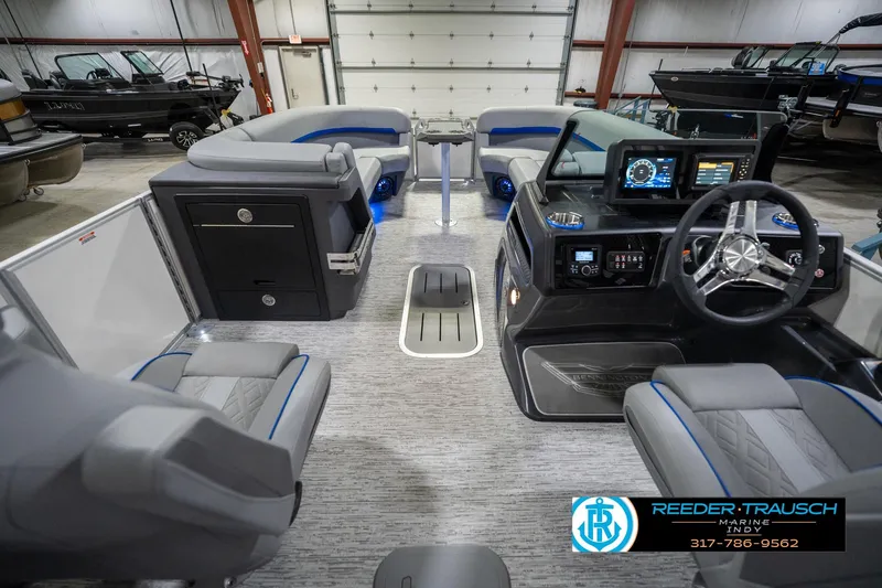 Slide: The Image of Interior of 2026 Bennington 24 MOFB pontoon boat with modern dashboard and seating. - 20