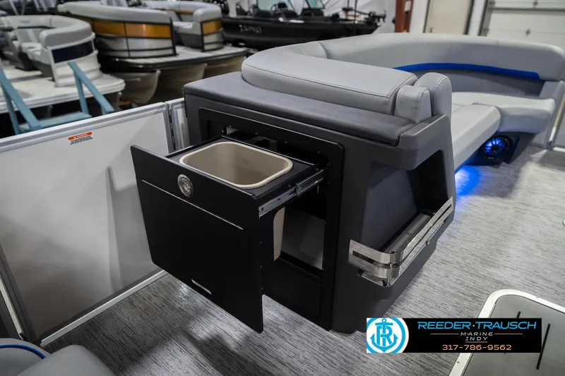 Slide: The Image of 2026 Bennington 24 MOFB pontoon boat interior with built-in storage and seating. - 27