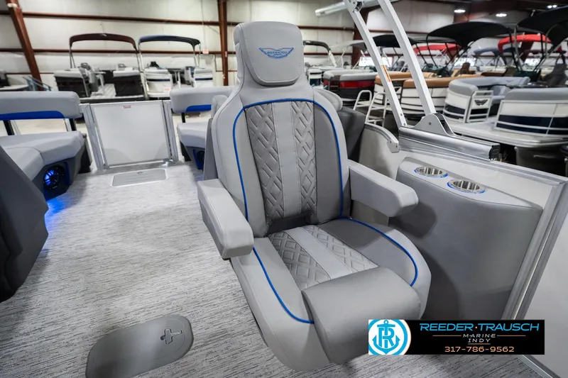 Slide: The Image of 2026 Bennington 24 MOFB boat interior with luxury seating and cup holders. - 30