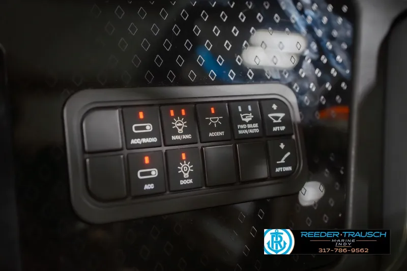 Slide: The Image of Control panel of 2026 Bennington 24 MOFB boat with various switches and indicators. - 39