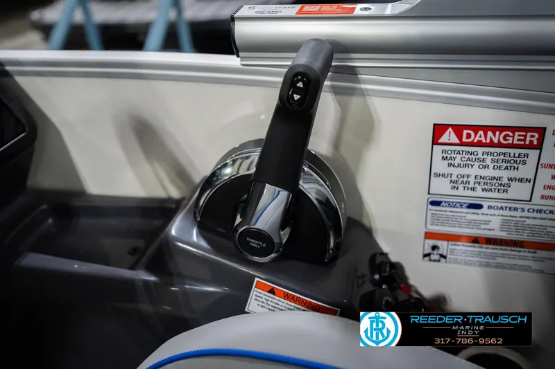 Slide: The Image of Throttle control of 2026 Bennington 24 MOFB boat with safety warnings and dealer logo. - 43